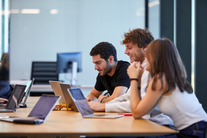 Students studying human behavior and social sciences at IE University