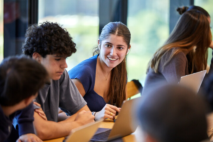 Students studying human behavior and social sciences at IE University