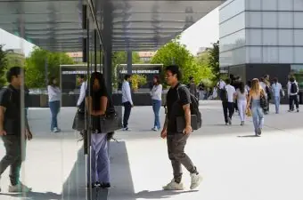 Students walking inside IE Tower