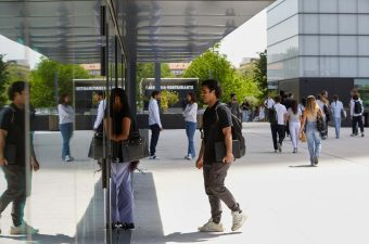 Students walking inside IE Tower