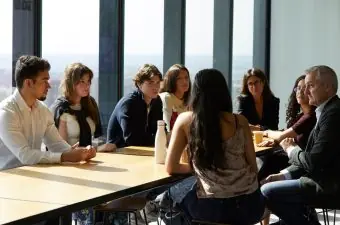 Students with professors IE tower