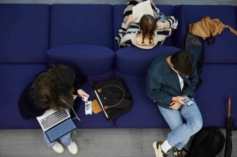 student lounging in sofa|BAM Students|people in double floor IE Tower|Math event IE Tower|people in double floor IE Tower