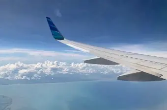 View,From,An,Airplane,Window,Featuring,The,Garuda,Indonesia,Winglet,